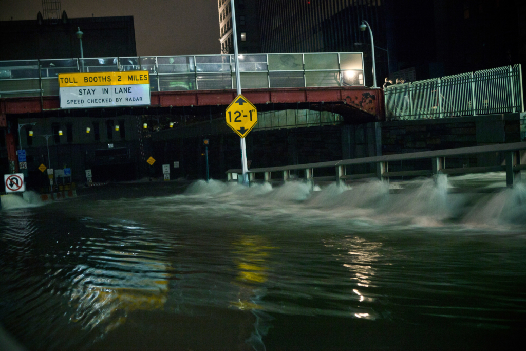 Water rushes into the Carey Tunnel as Hurricane Sandy hit New York City on October 29, 2012. (Andrew Burton/Getty Images)